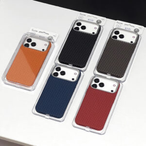 Several textured phone cases in orange, navy, black, and red are displayed in clear plastic packaging on a white surface, angled across the frame.